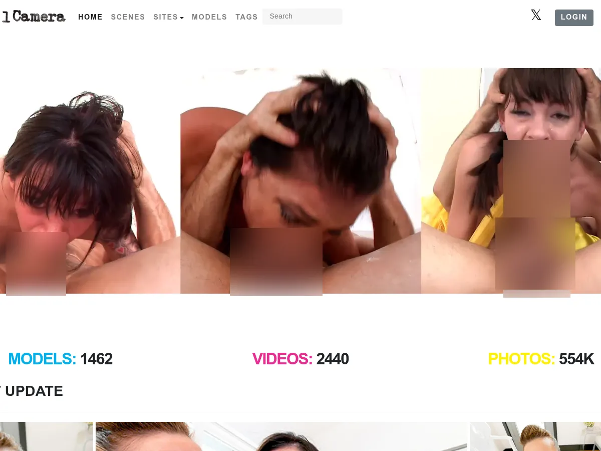 A heavily blurred, censored capture of the 2Girls1Camera homepage โ only soft shapes are visible, no explicit or readable content
