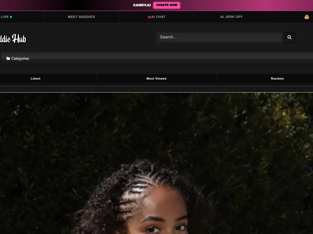 A heavily blurred, censored capture of the BaddieHub homepage โ only soft shapes are visible, no explicit or readable content