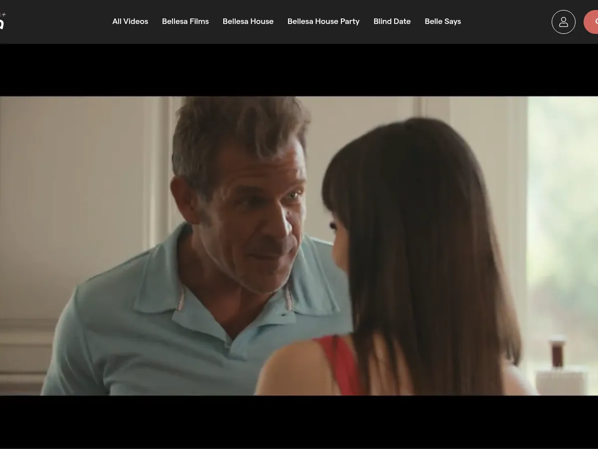 A heavily blurred, censored capture of the Bellesa Films homepage โ only soft shapes are visible, no explicit or readable content