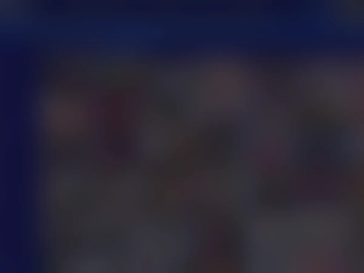 A heavily blurred, censored capture of the XNXX Cams homepage — only soft shapes are visible, no explicit or readable content