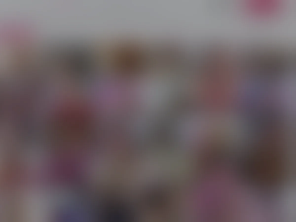 A heavily blurred, censored capture of the Camster homepage — only soft shapes are visible, no explicit or readable content
