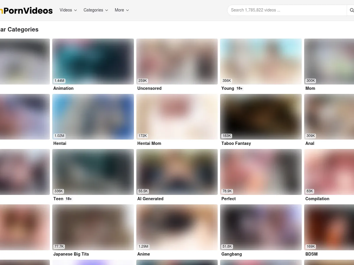 A heavily blurred, censored capture of the CartoonPornVideos homepage โ only soft shapes are visible, no explicit or readable content