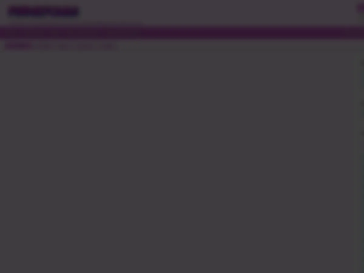 A heavily blurred, censored capture of the DeluxeDivas homepage — only soft shapes are visible, no explicit or readable content