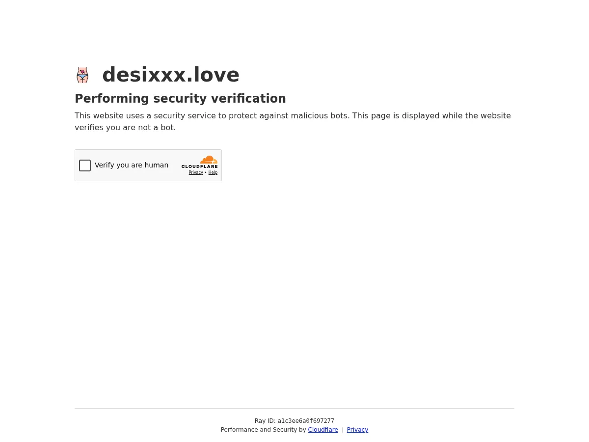 A heavily blurred, censored capture of the DesiXXX homepage — only soft shapes are visible, no explicit or readable content