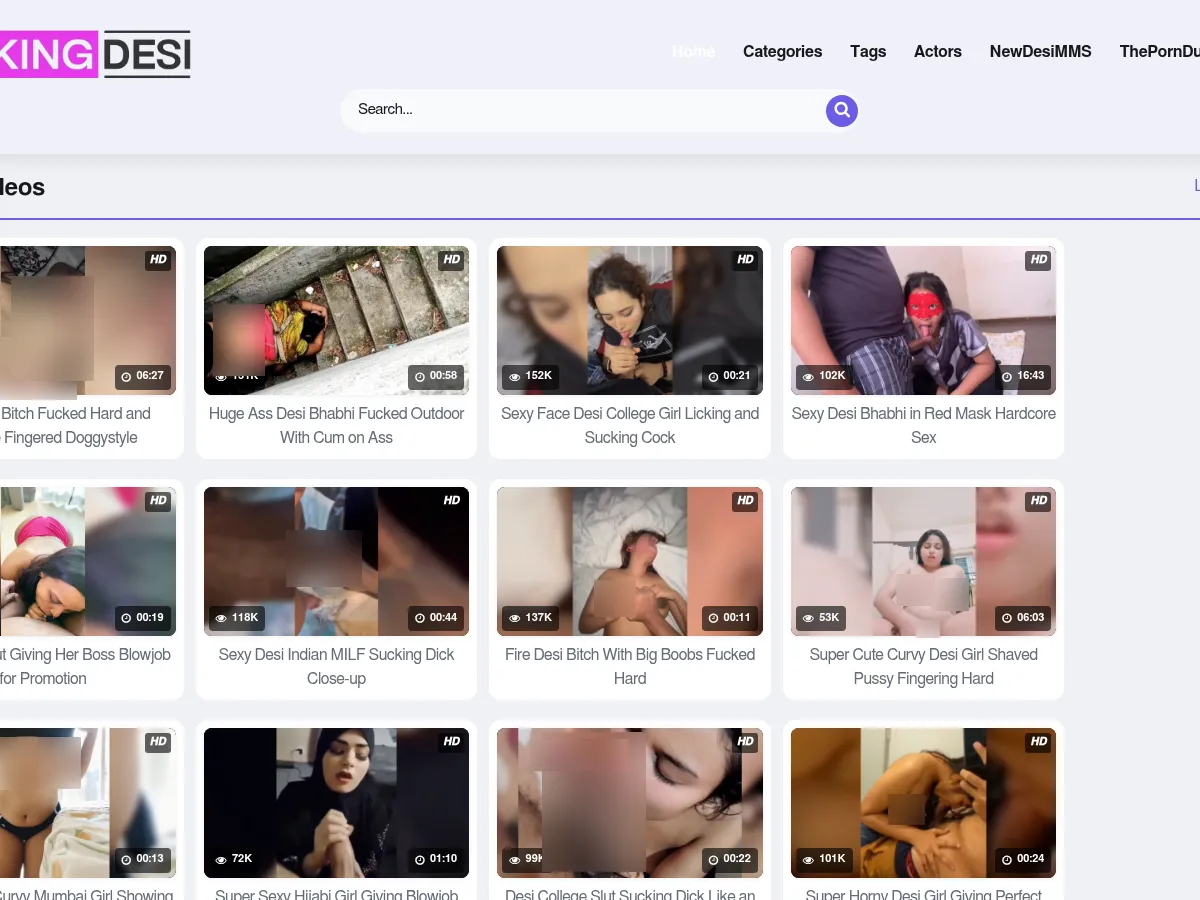 A heavily blurred, censored capture of the FuckingDesi homepage — only soft shapes are visible, no explicit or readable content