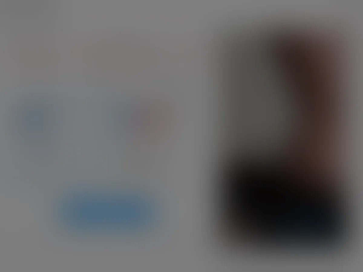 A heavily blurred, censored capture of the Glamino Girls homepage โ only soft shapes are visible, no explicit or readable content