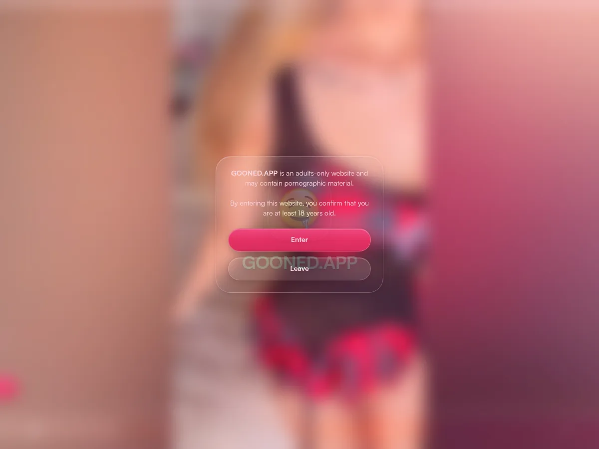 A heavily blurred, censored capture of the Gooned App homepage — only soft shapes are visible, no explicit or readable content