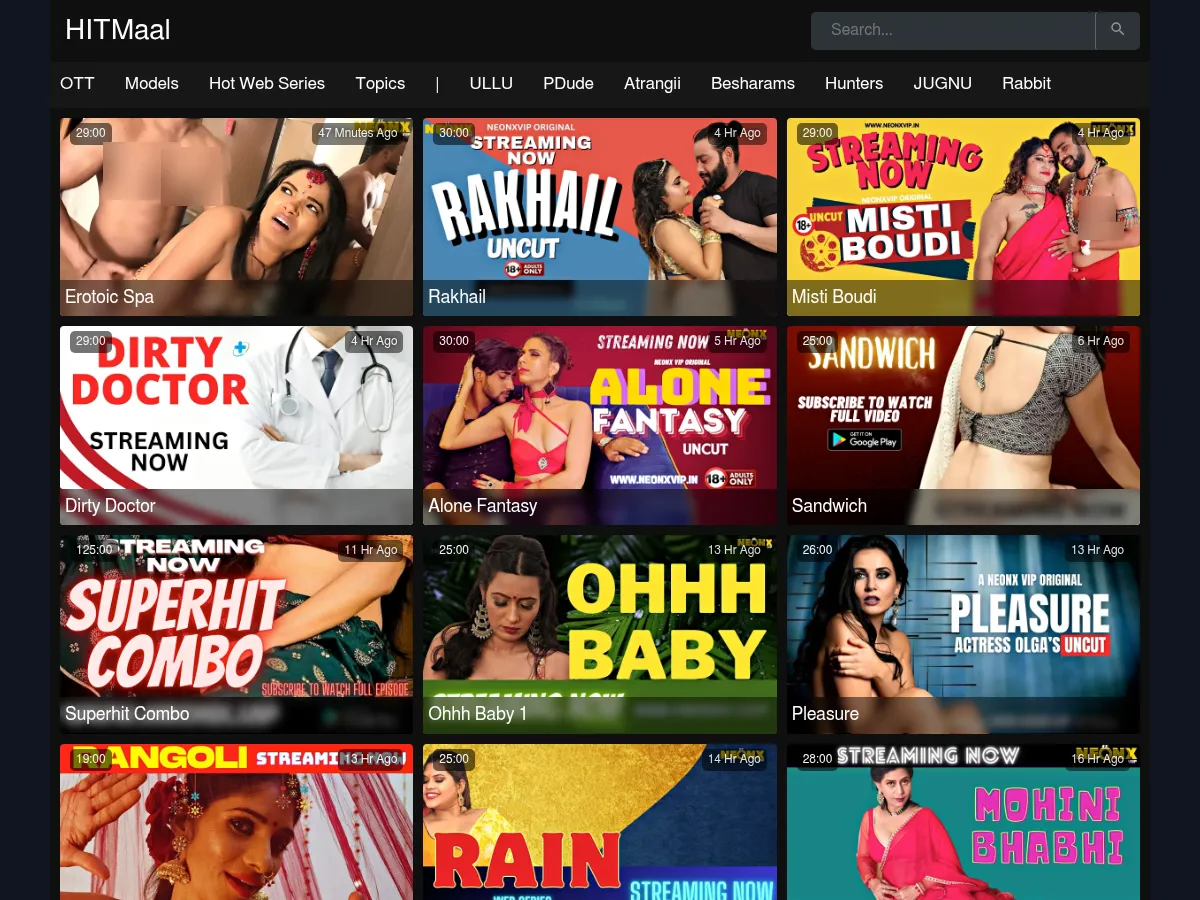 A heavily blurred, censored capture of the HITMaal homepage — only soft shapes are visible, no explicit or readable content