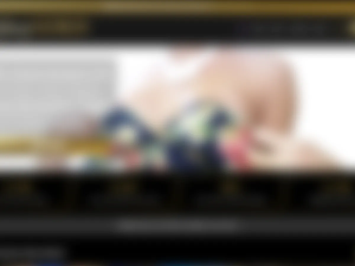 A heavily blurred, censored capture of the LadyboyGold homepage โ only soft shapes are visible, no explicit or readable content