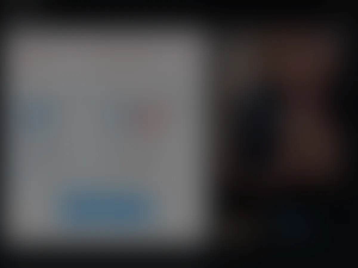 A heavily blurred, censored capture of the Mike Big Dick homepage — only soft shapes are visible, no explicit or readable content