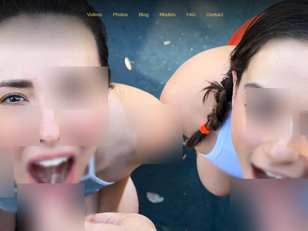A heavily blurred, censored capture of the Piss Play homepage — only soft shapes are visible, no explicit or readable content