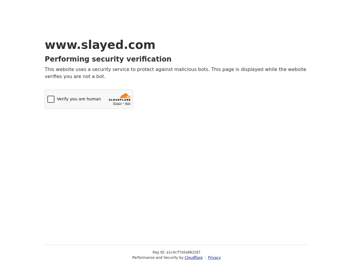 A heavily blurred, censored capture of the SLAYED homepage — only soft shapes are visible, no explicit or readable content