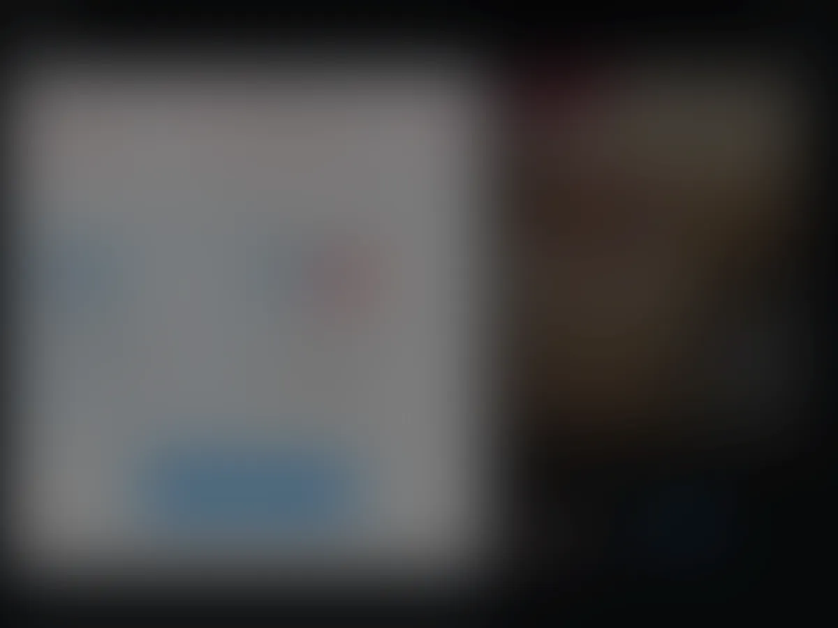 A heavily blurred, censored capture of the SPY 26 homepage — only soft shapes are visible, no explicit or readable content