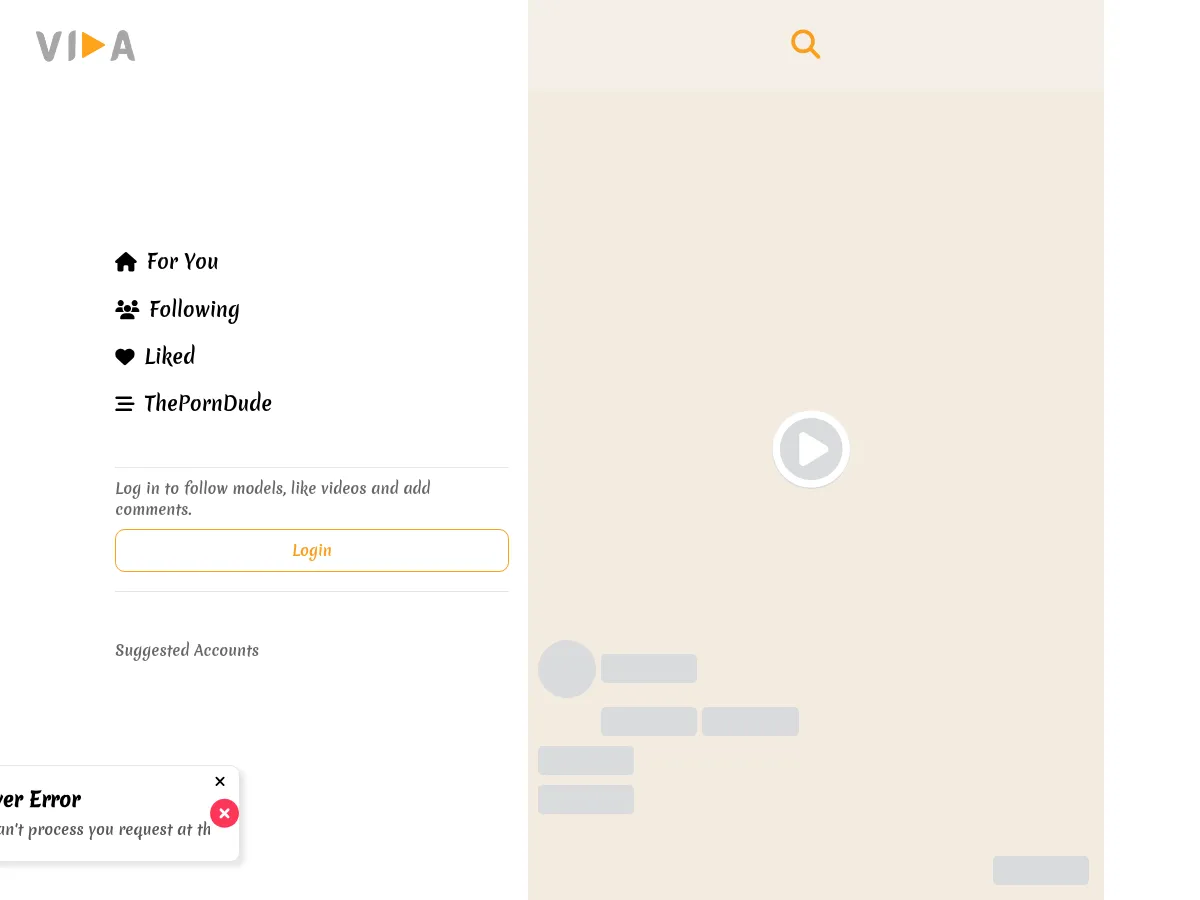 A heavily blurred, censored capture of the VidaVideos homepage โ only soft shapes are visible, no explicit or readable content